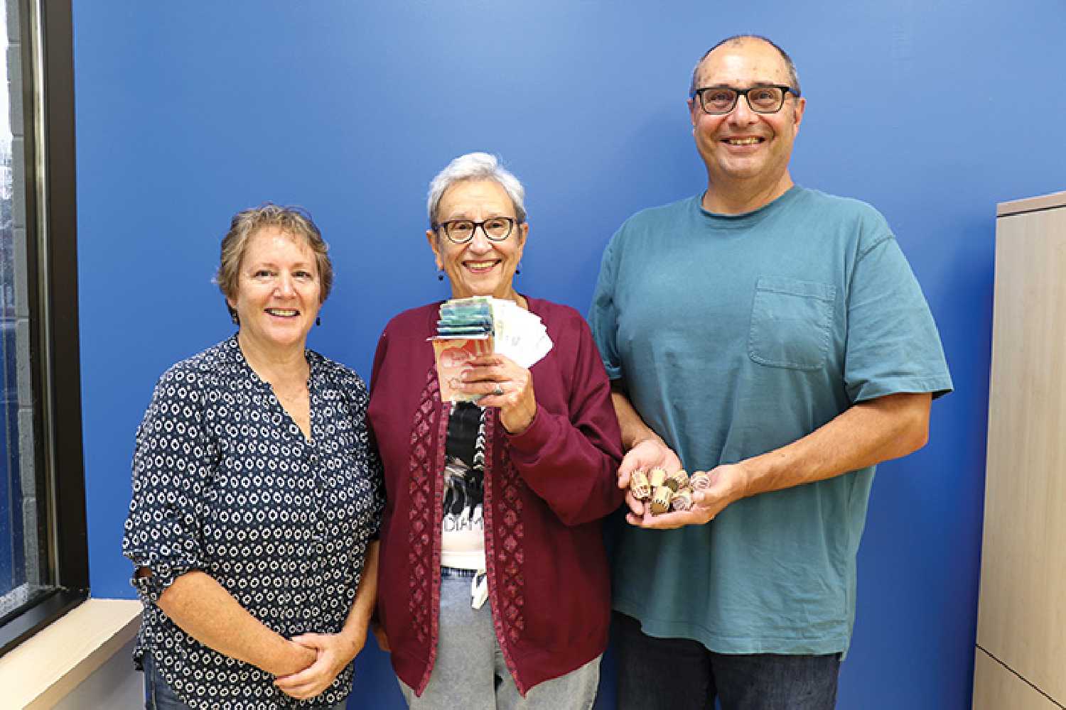 Sharon Brolund donated $1,365 to the Moosomin CT Scanner Fund last Thursday. From left are, Wendy Lynd of the Moosomin and District Health Care Foundation accepting the donation from Sharon Brolund and her son, Michael Brolund.